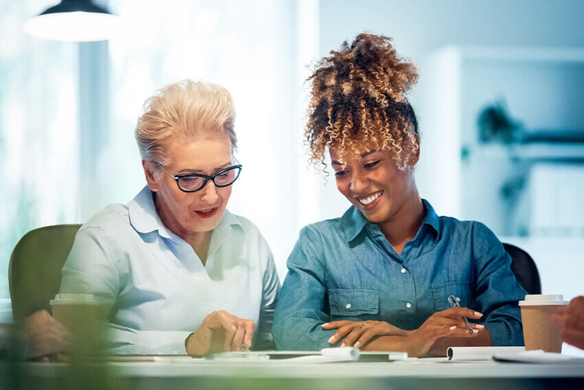 Two women discussing how to find the right career path.