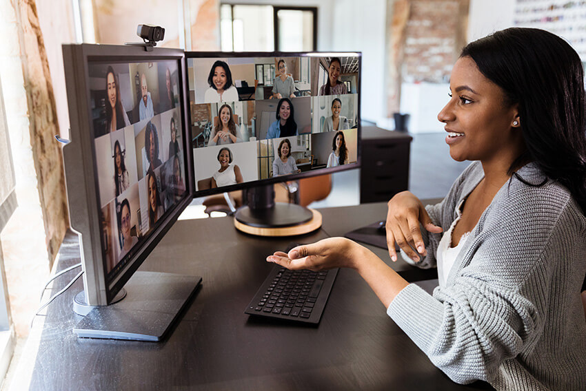 Woman having a virtual meeting with her colleagues